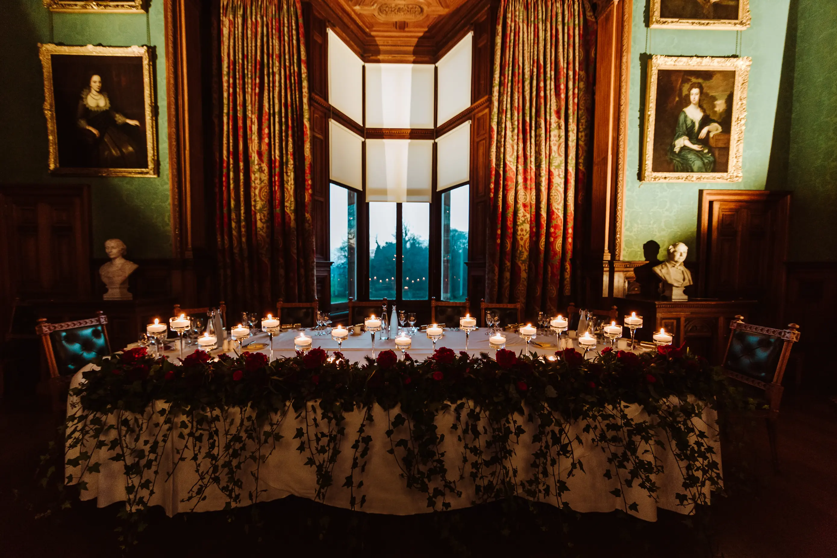 Ceremony table long and low design moved to a long top table for the wedding breakfast with added candles